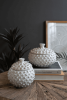 SET OF TWO ROUND KNOBBY WHITE CERAMIC  CANISTERS