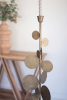 SET OF TWO ANTIQUE BRASS CANDLE HOLDERS WITH ROUND DISCS DETAIL