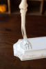 RUSTIC WHITE METAL SKELETON ON A STAND