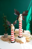 SET 2 RECYCLED IRON MOOSE W RED & WHTE PAINTED WOOD BASES