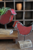 SET OF TWO RED METAL BIRD PLANTERS