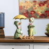Raincoat Duck Figurine with Umbrella